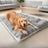 Grey reversible plush pet sleeping mat for dogs and cats