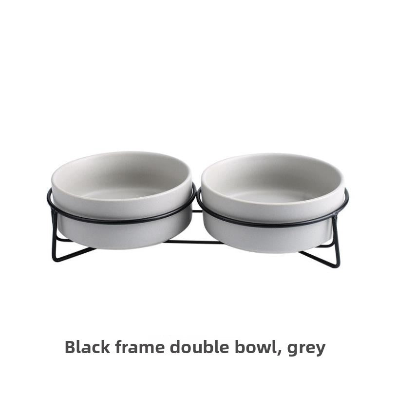 Raised glazed ceramic pet bowl on a stand in pastel yellow, view 8