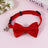 Striped cat collar with velvet bow, available from Pet Royale UK