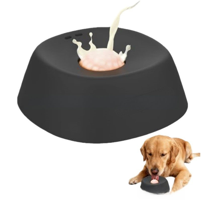 Dog licking bowl