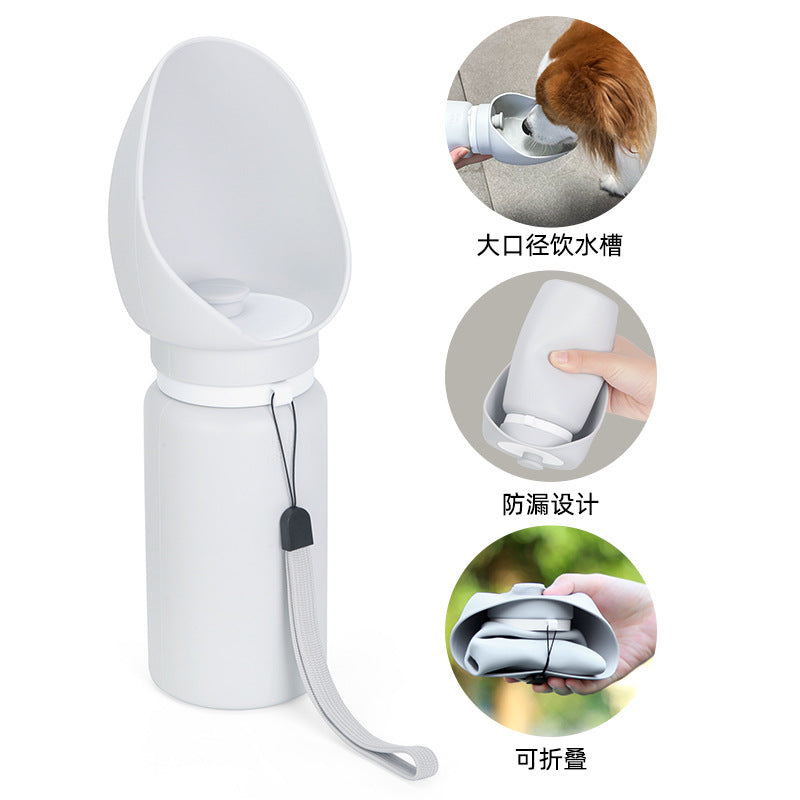 Foldable dog water bottle with silicone bowl in Bright Yellow, side view