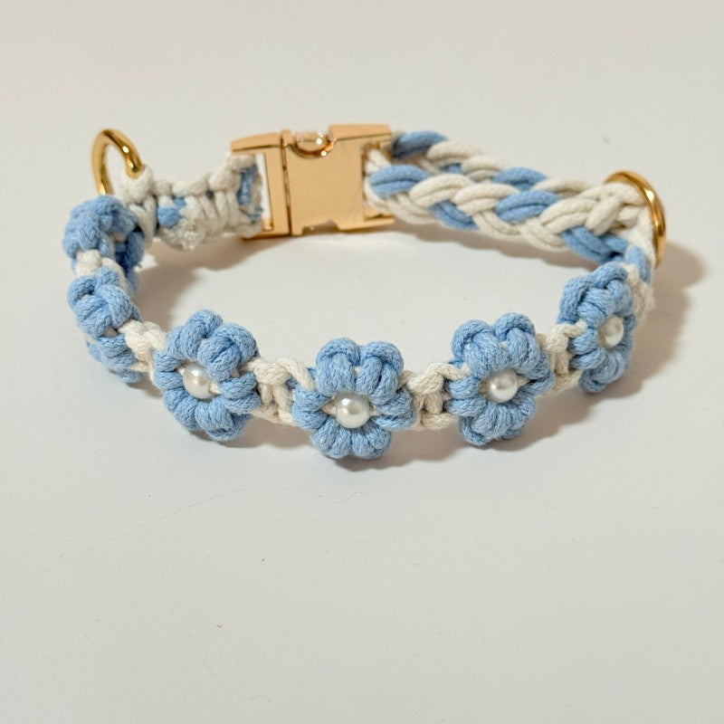 Handmade woven boho pet collar with pearl flowers, in use with a pet