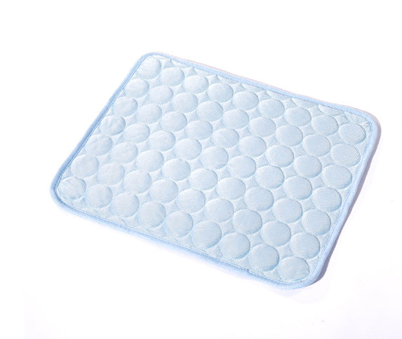Cat resting on a pink trim ice silk cooling mat