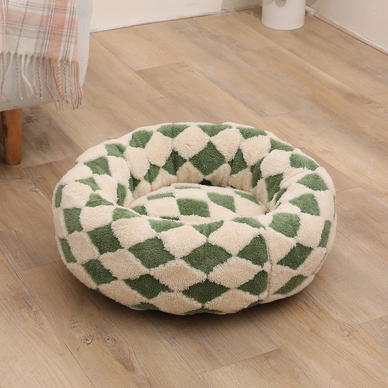 Plush round pet bed in check and floral prints, second detail photo