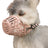 Ventilated beige plastic dog muzzle with adjustable head strap, product image 1