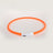 Rechargeable LED silicone dog collar in Pink, in use with a pet
