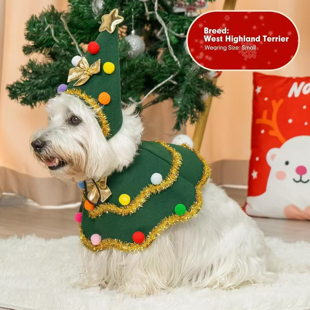 Green festive dog cape with cartoon Christmas design