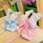 Princess cotton dog dress with matching lead, in a home setting