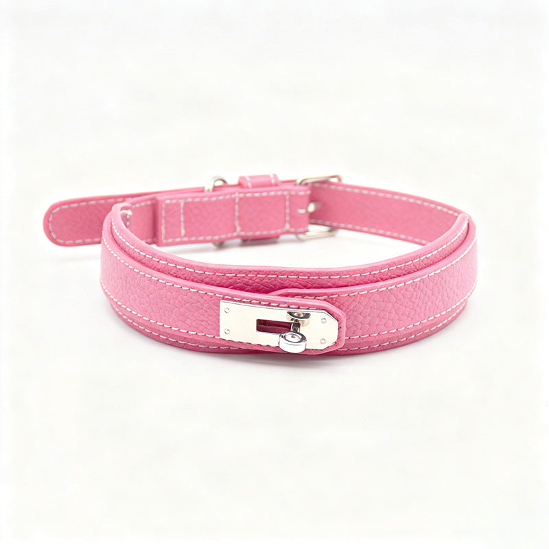 Matching dog collar, lead and poo bag holder in black and pink