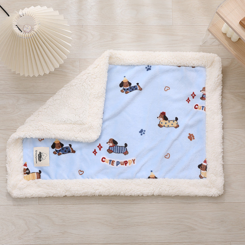 Cat curled up on a planet cat print pet blanket
