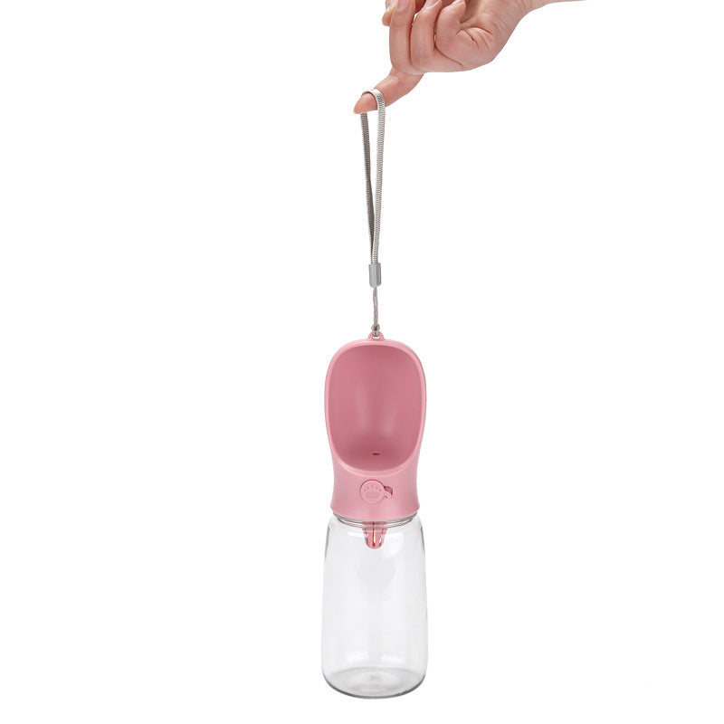 Leakproof dog walking water bottle in Pink 350ml, side view