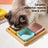 Square ceramic pet dishes on a raised bamboo feeding tray, view 2