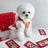 Hooded Tang suit New Year outfit for pets in Floral, in a home setting