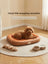 Waterproof leatherette oval dog bed in coffee orange