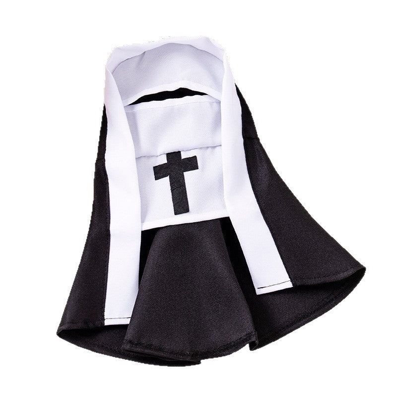Cat dressed in a black and white nun uniform costume