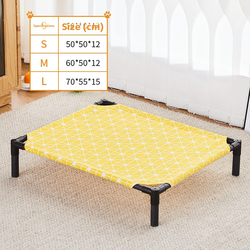 Small dog resting on an elevated bed with cyan alpaca pattern