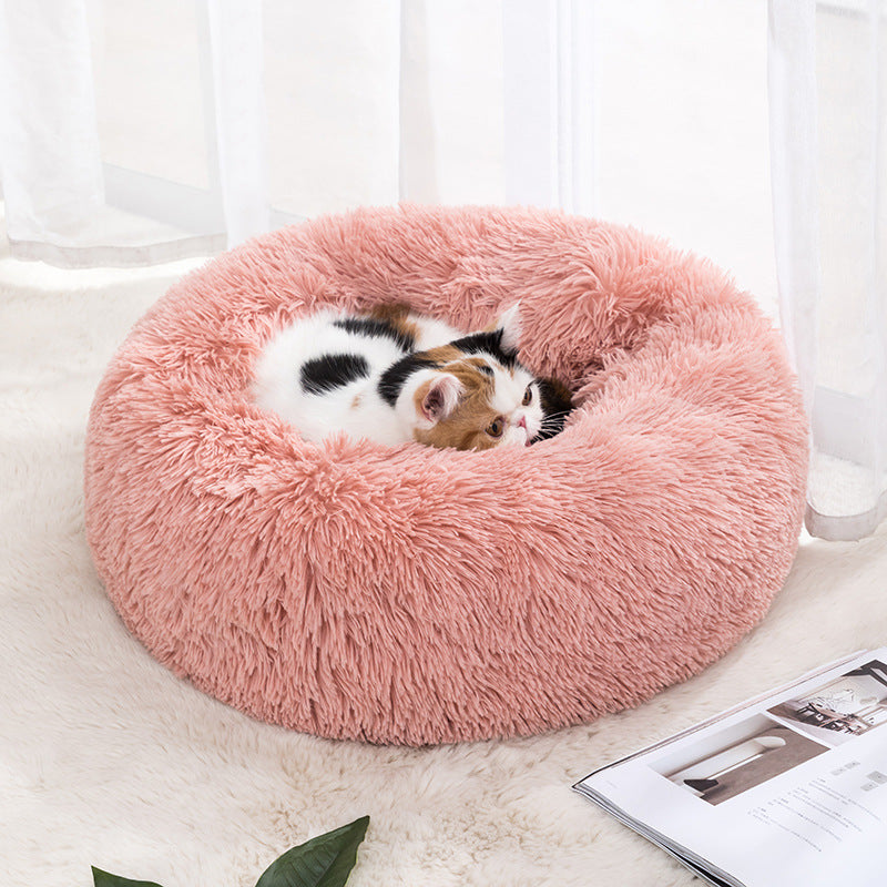 Light grey round plush pet bed with deep nest shape