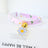 Floral cat collar with bell and safety buckle in Yellow Double Layer, top view