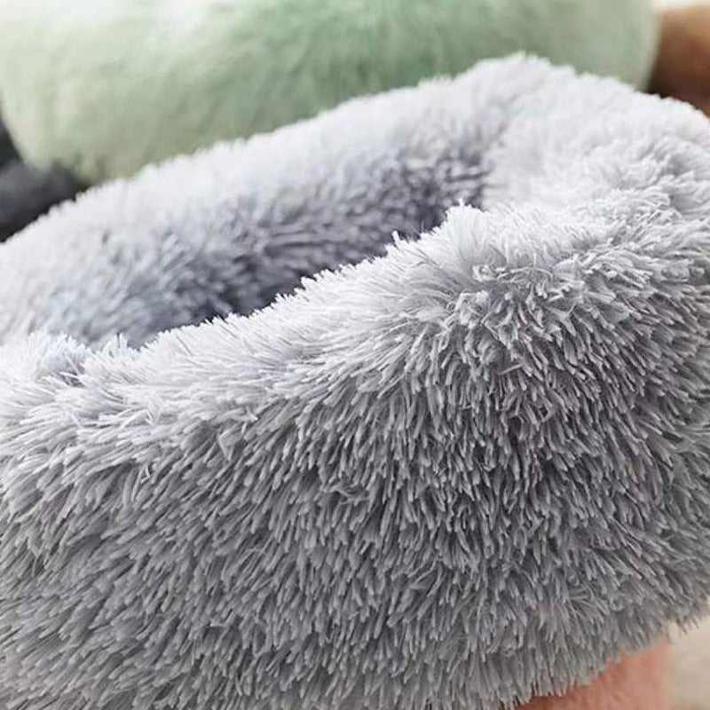 Round long plush nest bed for cats and dogs, shown in 48 colours and styles