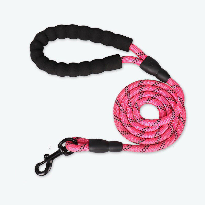 Reflective nylon dog lead in fluorescent green on a walk