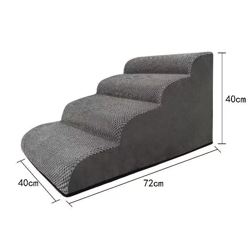 Beige two-step dog steps placed beside a sofa