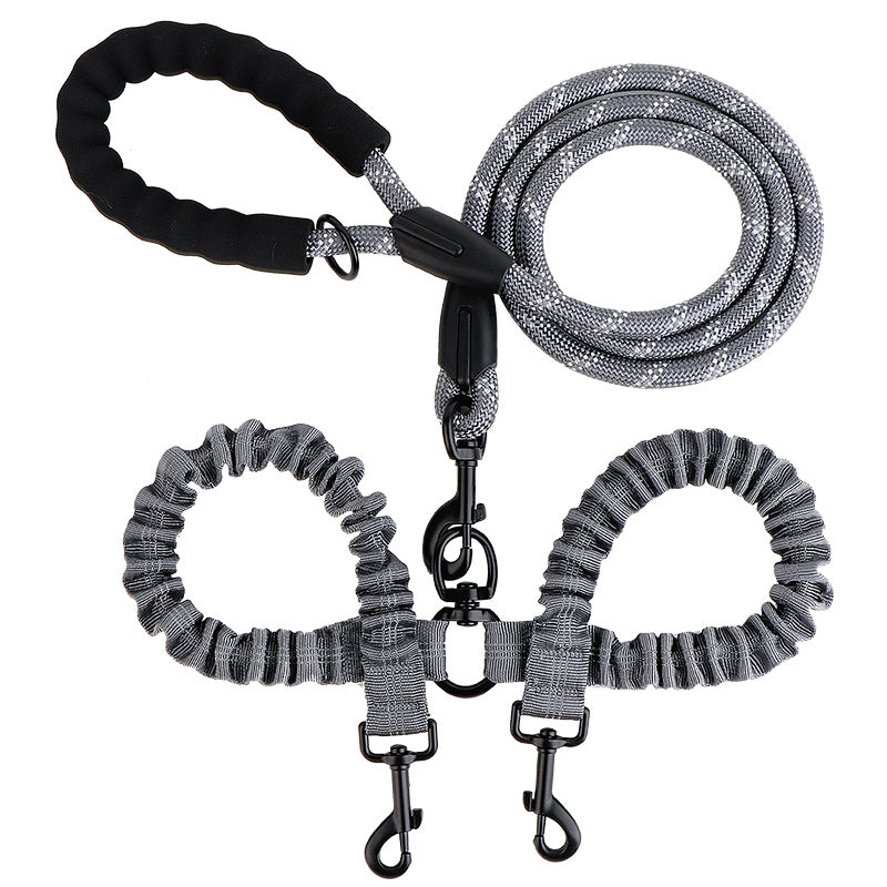 Double ended retractable lead for walking two dogs from one handle