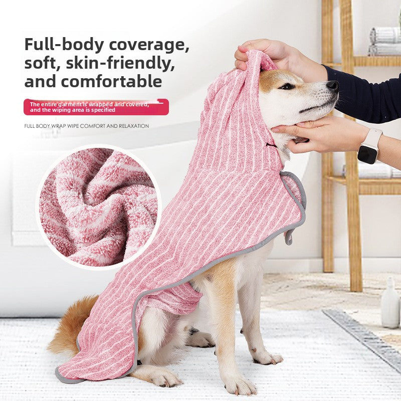 Dog wrapped in a pink striped quick dry bathrobe towel